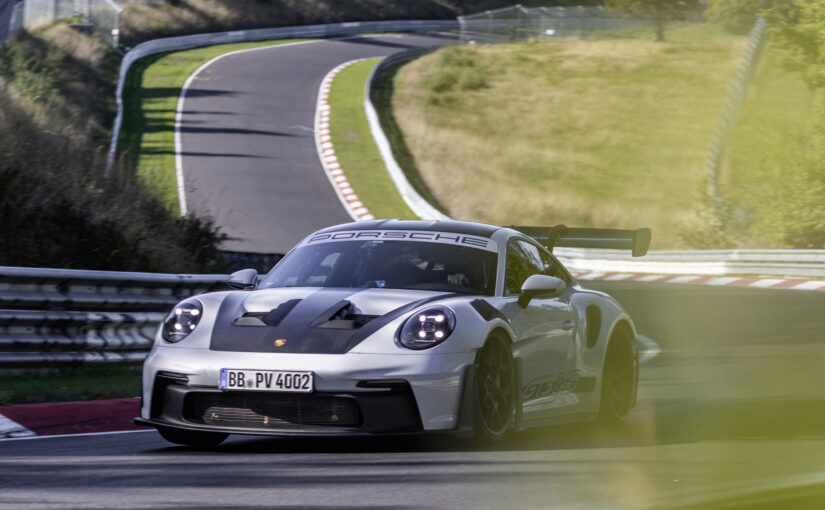 Watch the 2023 Porsche 911 GT3 RS splash the ‘Ring in 6:49